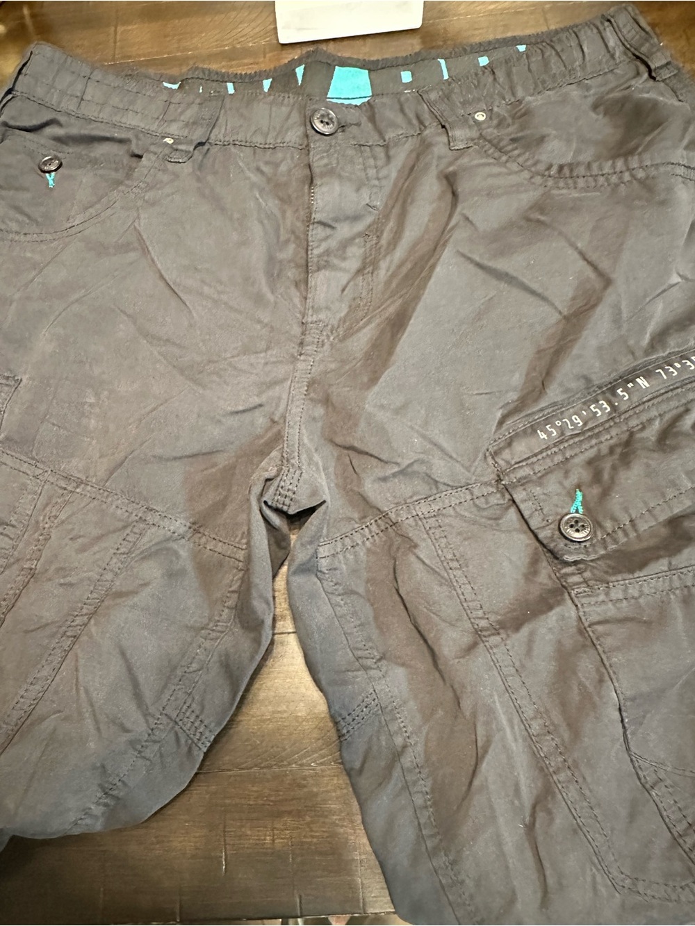 Human Made Black Cargo Shorts with Teal Stitch Accents